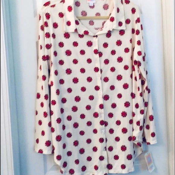 LuLaRoe Tops - NWT LuLaRoe Valentina cream w/firework design